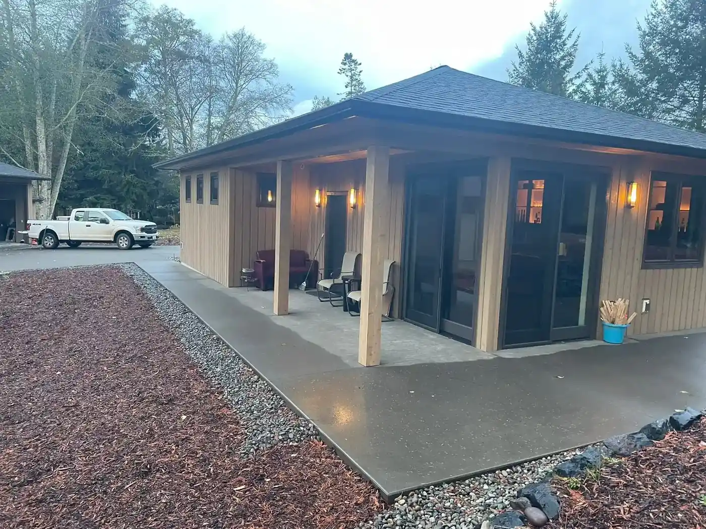 Modern custom home with wood siding built by CKS Builders LLC in Port Angeles, WA