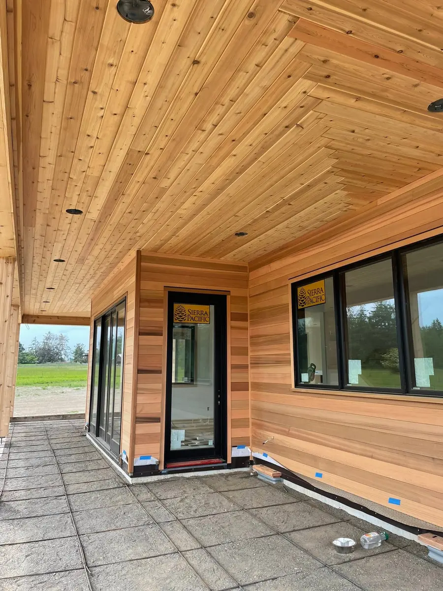 Cedar ceiling and open living space overlooking a mountain view in Clallam County, WA
