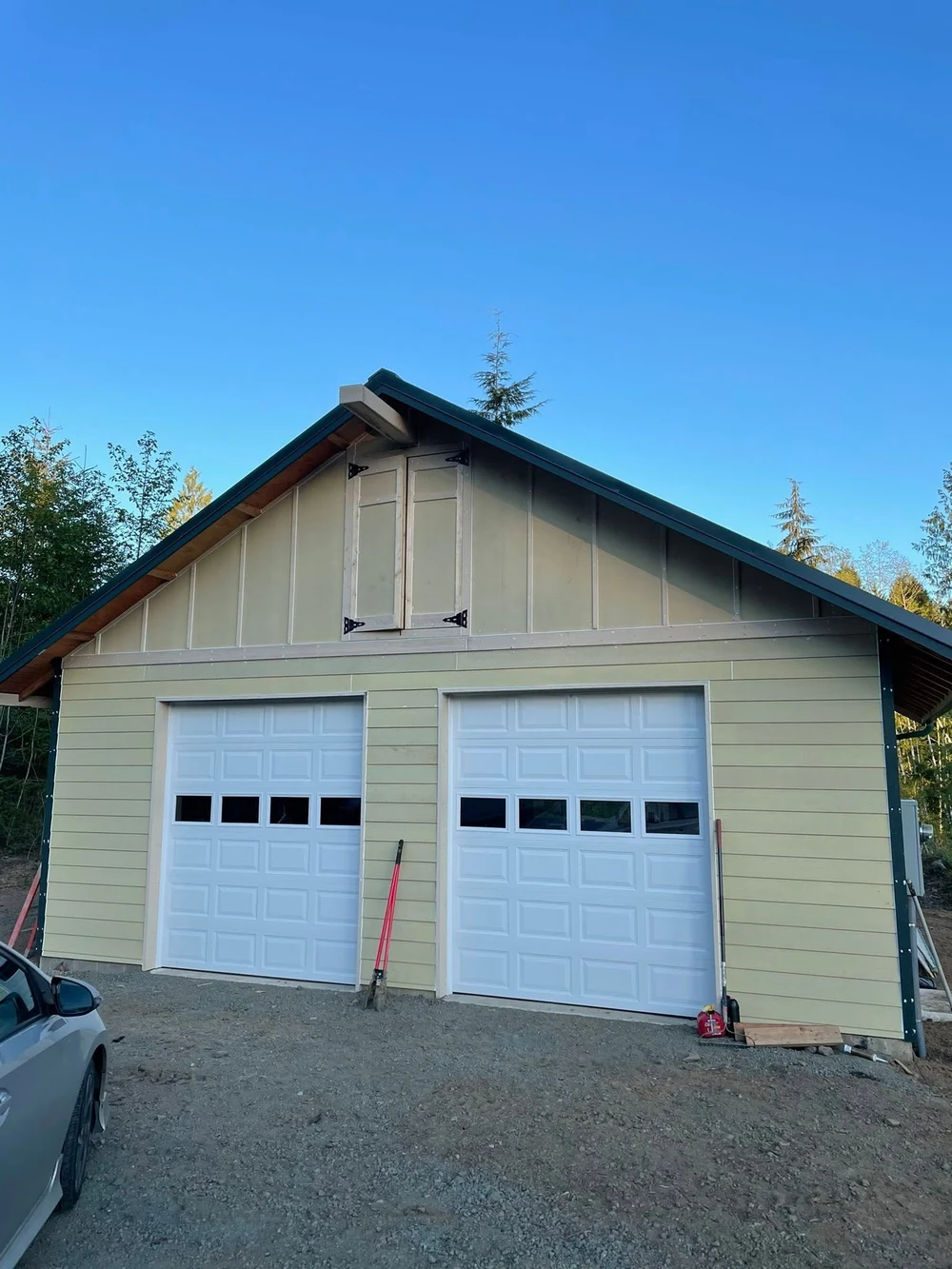 Finished detached outbuilding with board and batten siding and a new gable roof by CKS Builders LLC in Port Angeles, WA