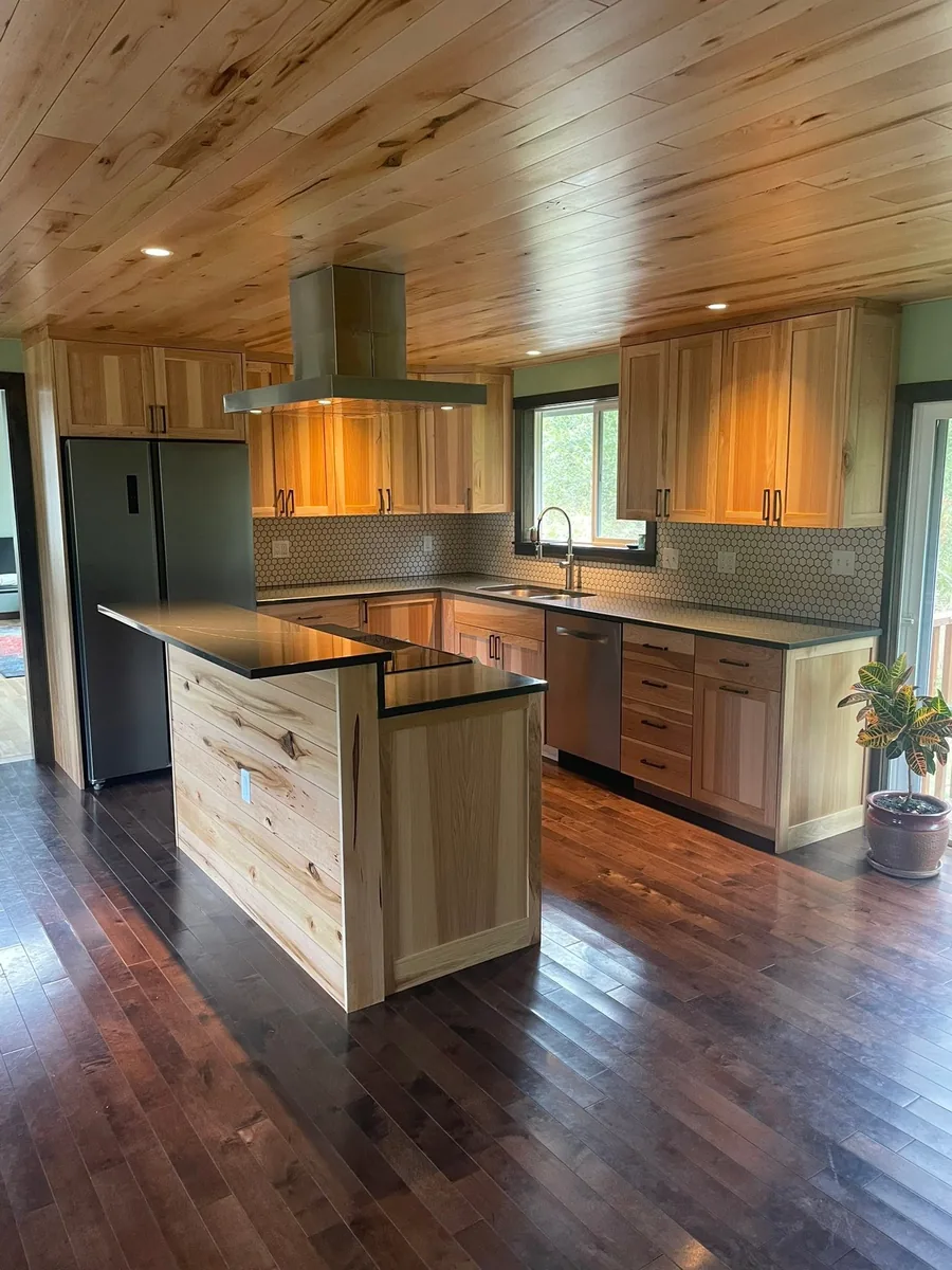 Remodeled kitchen with wood-clad ceiling and large island in Port Angeles, WA