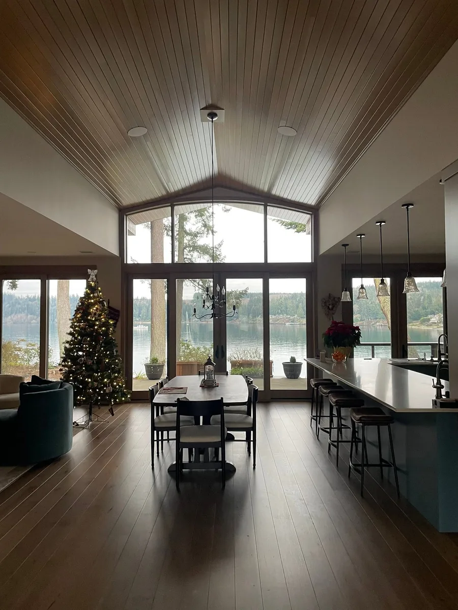 Vaulted living room with wood floors after a whole-home remodel in Port Angeles, WA