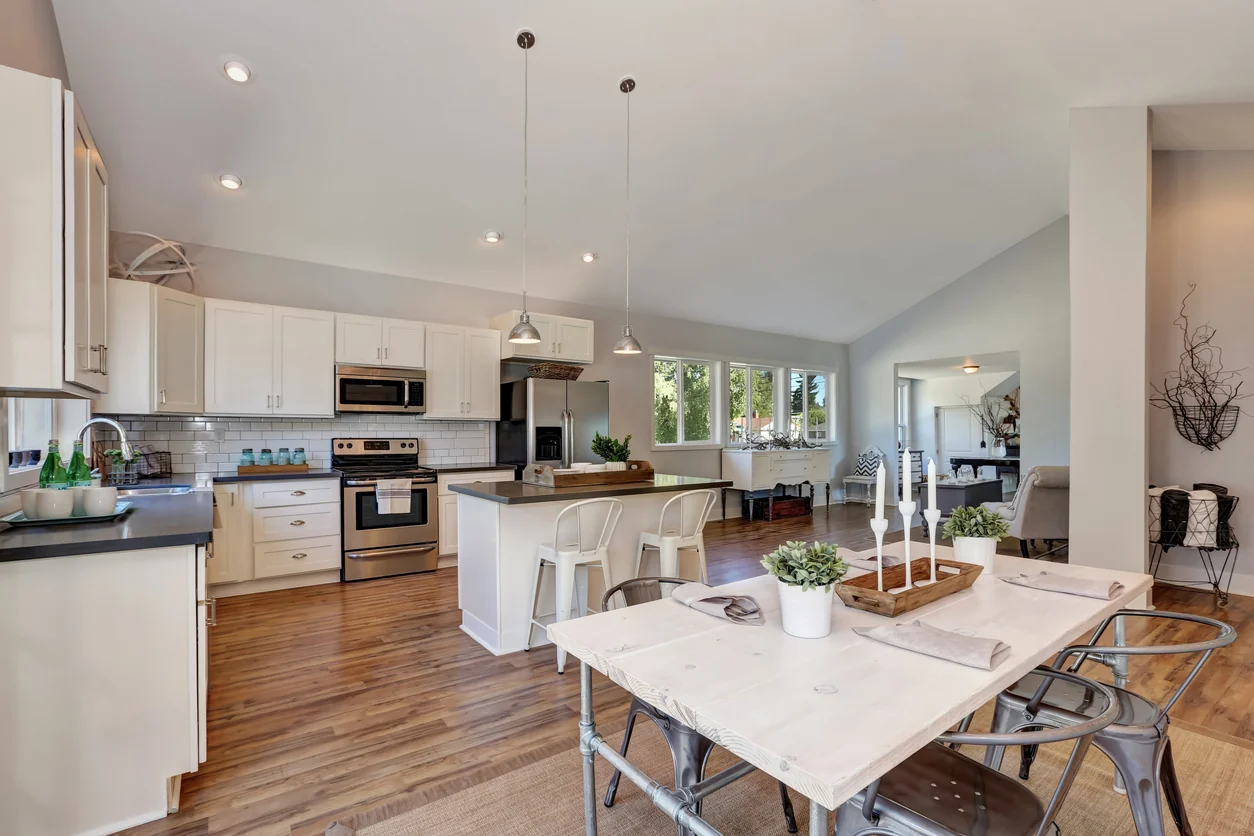 Open kitchen and dining area after a whole-home remodel
