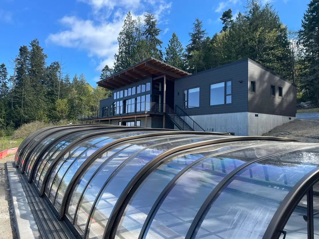 The same home completed with finished siding, decking, and landscaping by CKS Builders LLC near Port Angeles, WA